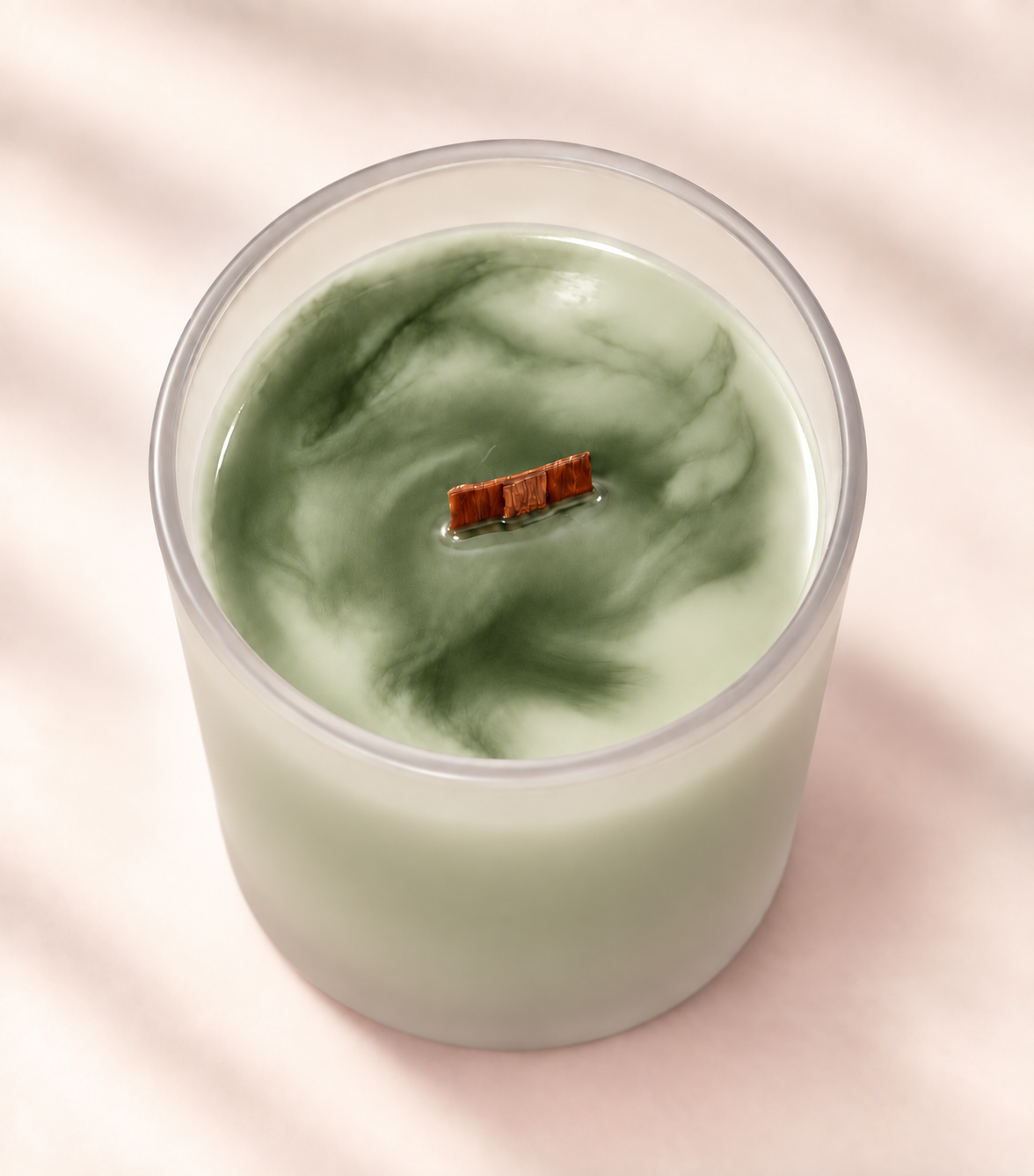 WISH Moments candle in green marbled soy wax with a wood wick