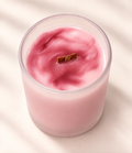 WISH Moments candle in pink marbled soy wax with a wood wick